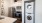 Well-lit kitchen with ample counter space and a laundry area