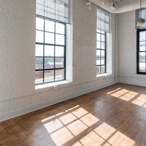 Open space living area with natural lighting