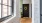 The entrance to a hallway with a window