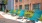 blue chairs in a sunny deck area