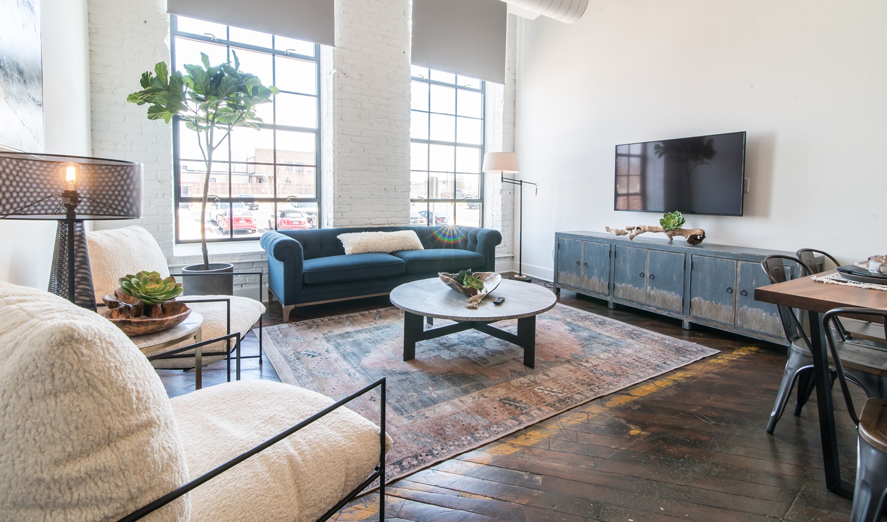 Open space living area with natural lighting
